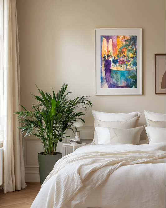 Neatly made bed in a bedroom with a plant and artwork on the wall.