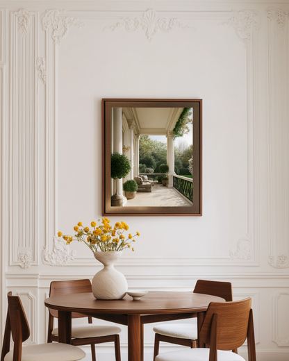 Dining room with wooden table, chairs, and a decorative photo wall art.