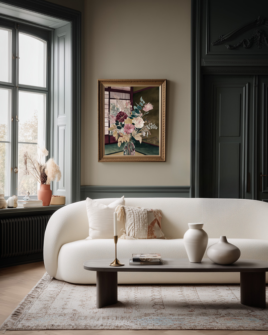 Living room with a white sofa, coffee table, and a luxurious olive green floral poster.