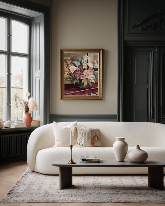 Living room with a white sofa, coffee table, and luxurious flower poster in deep dark colors.