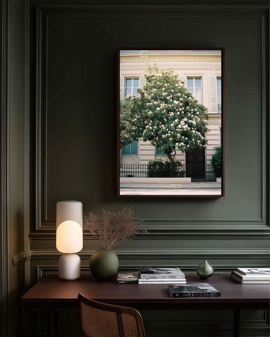 Luxury home office with dark green walls and Parisian photography wall art