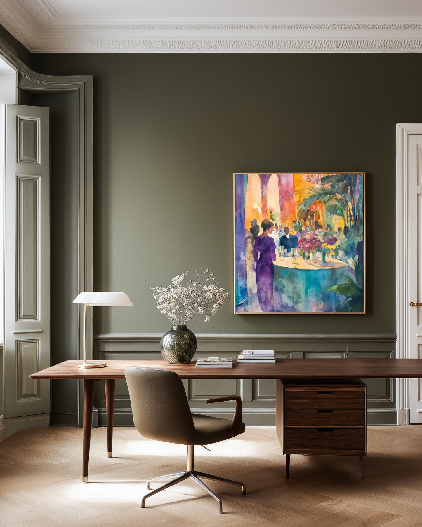 Modern office with a desk, chair, and colorful purple poster on the wall.