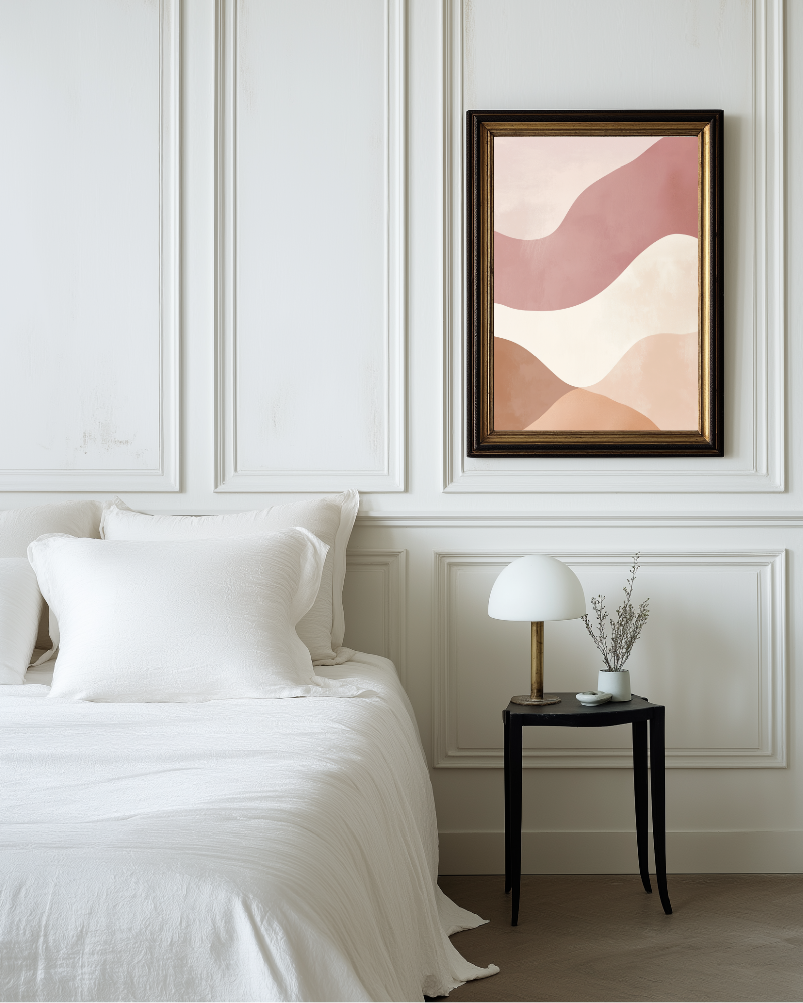 Modern bedroom with a bed, side table, and abstract pink and white soft colored art on the wall.