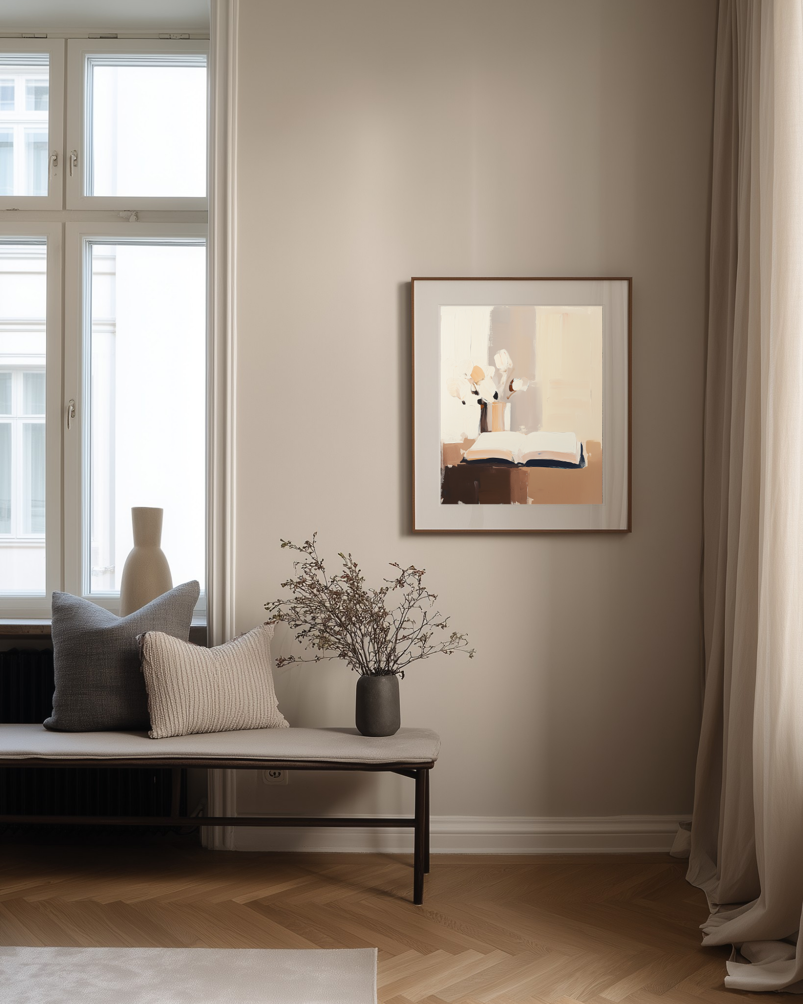 Modern interior with a bench, cushions, and a framed picture on a wall.