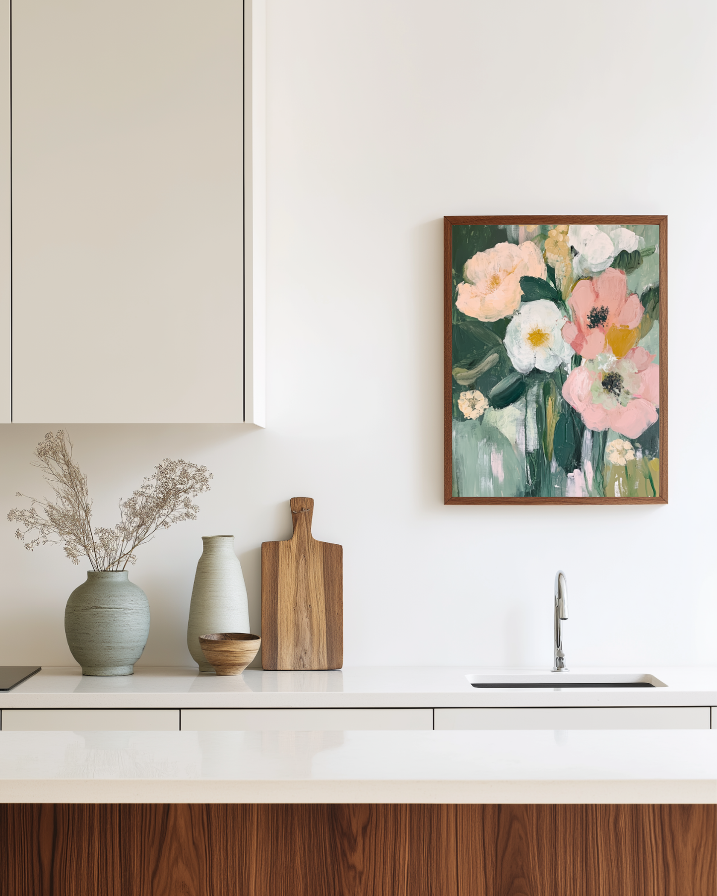 Floral painting on a kitchen wall with vases and a cutting board on the counter.