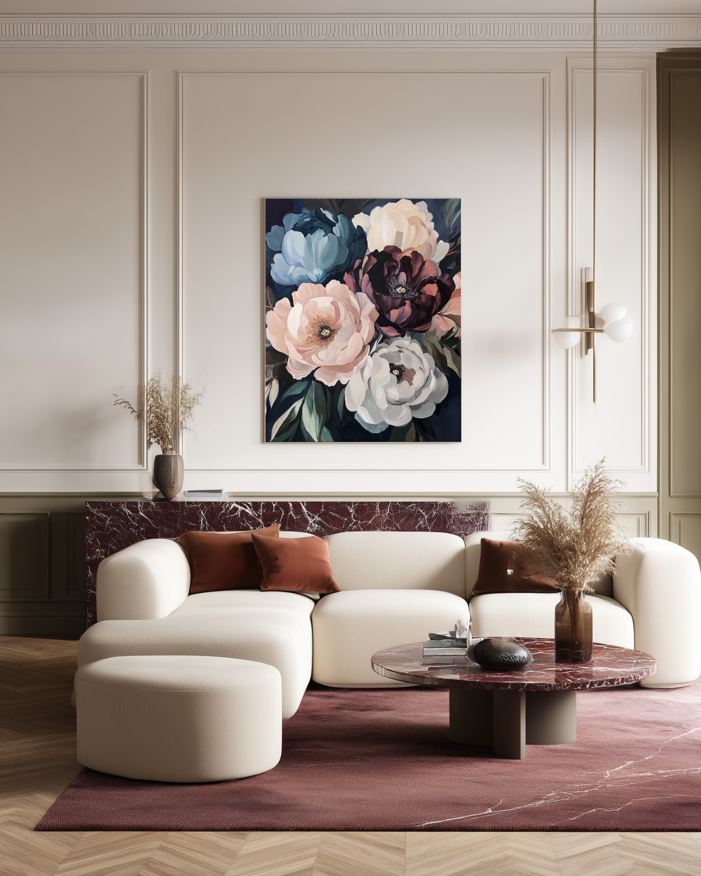 Modern living room with a white sofa, floral painting, and decorative burgundy elements.