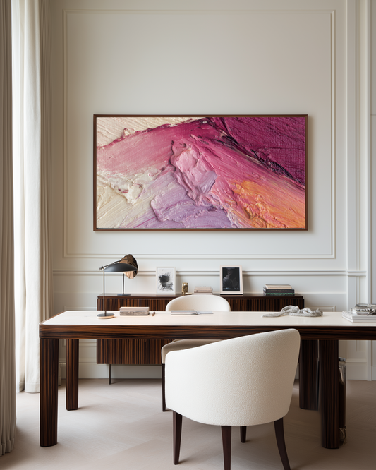 Modern office with a large abstract pink paint wall art, a desk, and a chair.