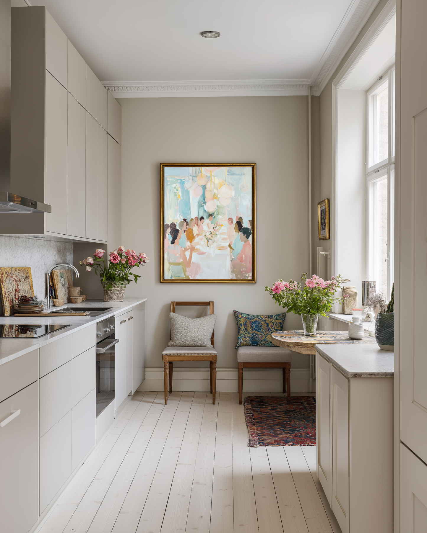 Modern kitchen with pastel painting, light wood cabinets, a dining area, and decorative elements.
