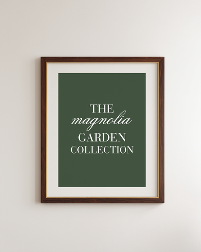 a dark green framed poster with white text "the magnolia garden collection"