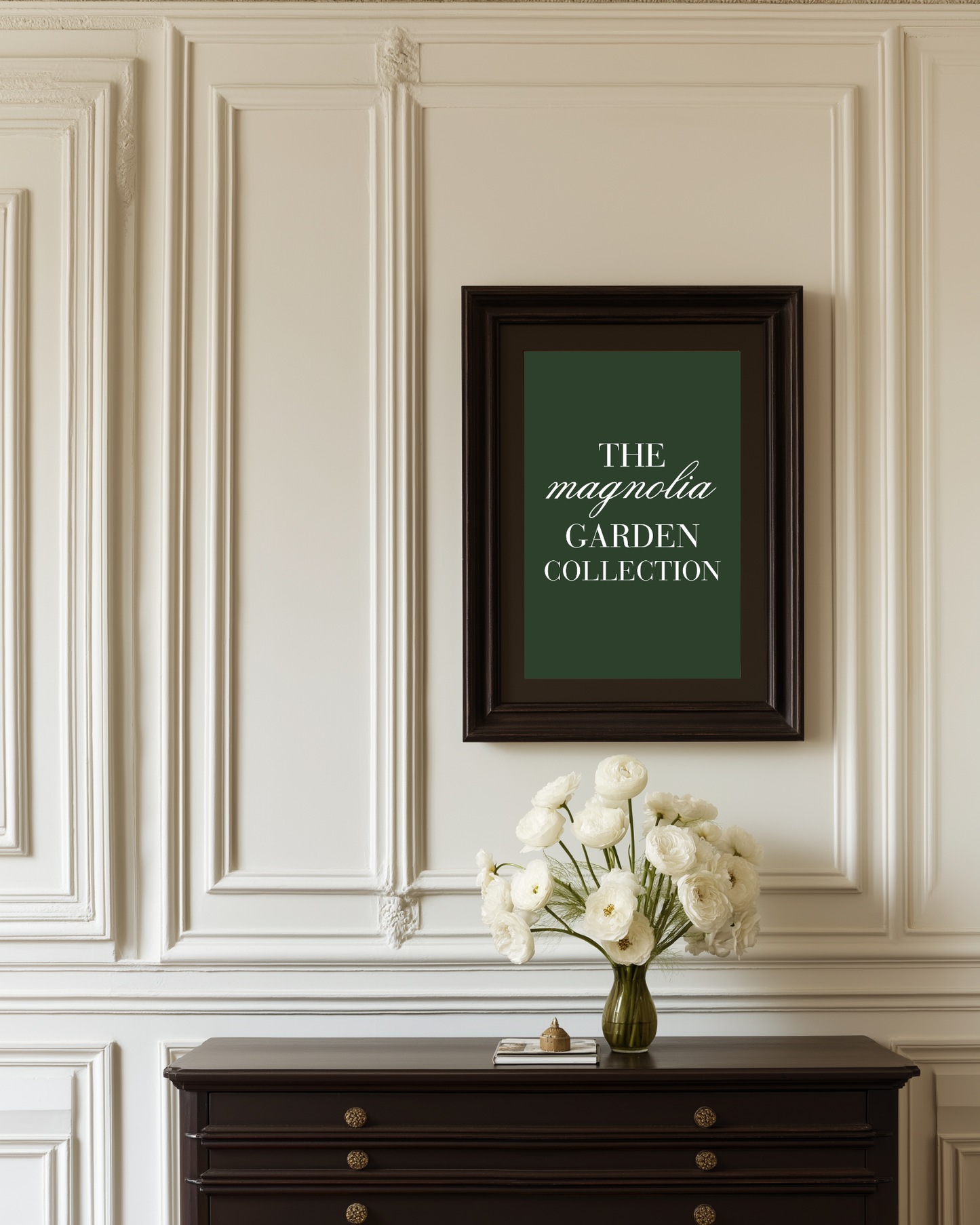 luxury hallway with white walls and a dark green poster with text "the magnolia garden collection"