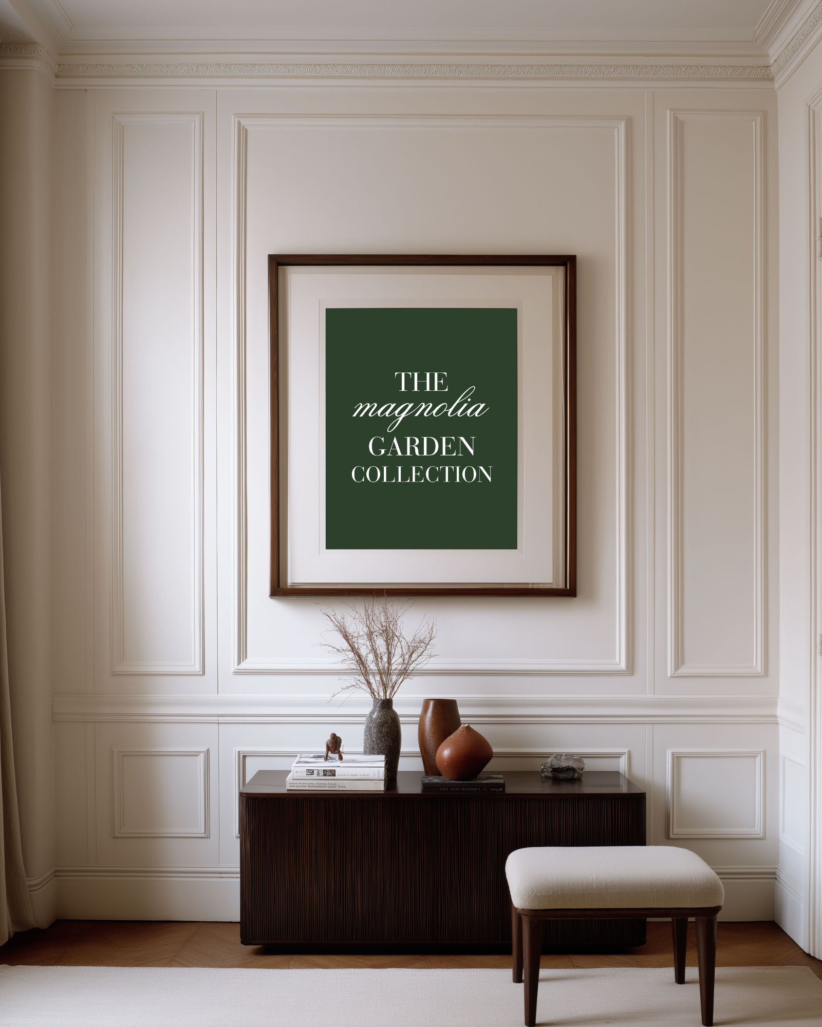 luxury living hallway with white paneled French walls and a dark green poster with text "the magnolia garden collection"