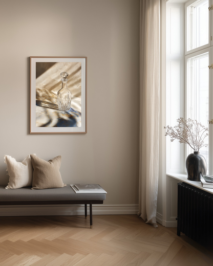 minimalist photography poster of a glass carafe in minimalist apartment